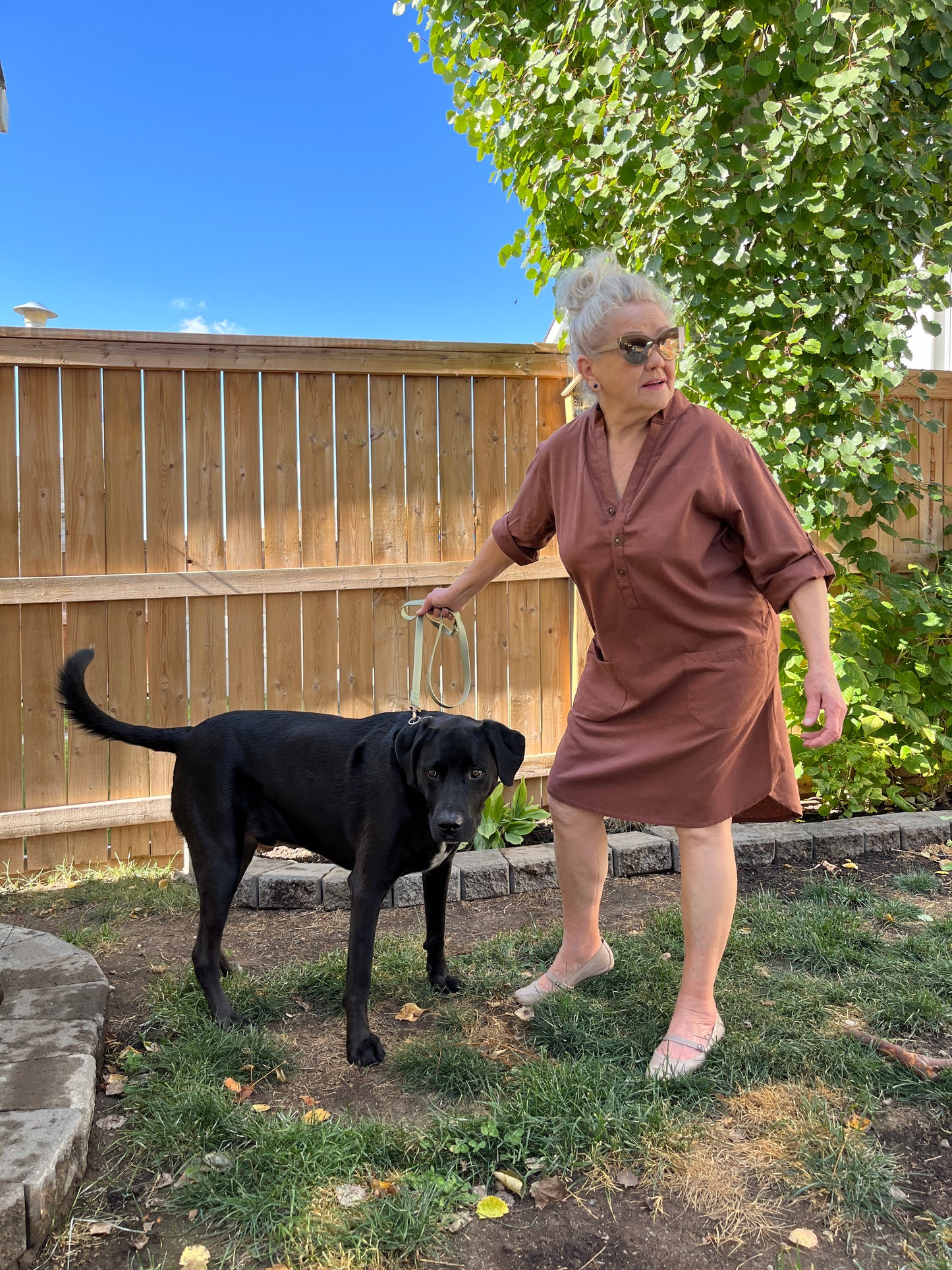 Woman in our raw silk dress with dog.